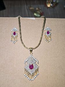 ruby and diamond pendant earrings