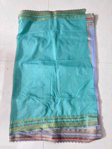 Beautiful Teal Saree with Gold Accents