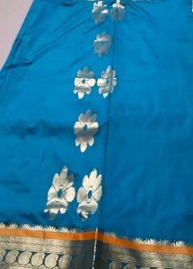 Elegant Teal and Gold Saree