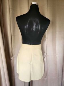 Light Yellow Pleated Mini Skirt