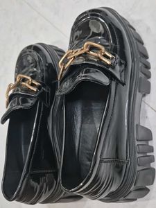 Chic Black Patent Loafers with Gold Chain Accent