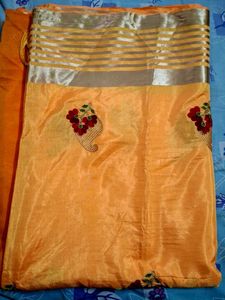 Elegant Orange Saree with Embroidery