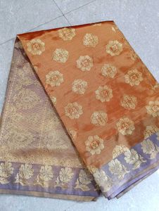 Orange Saree with Brocade Blouse