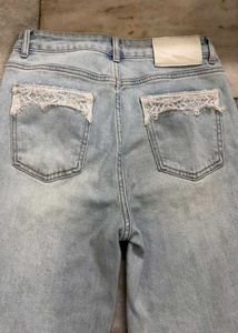 Light Wash Denim Jeans with Lace Detail