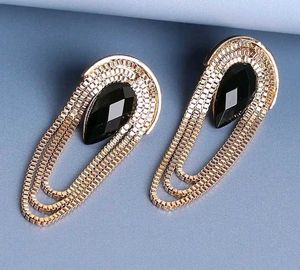 Elegant Gold Dangle Earrings with Black Stone