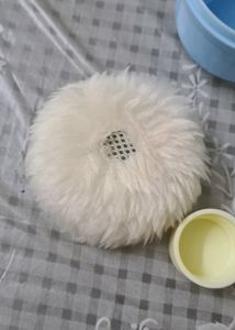 Baby powder puff with a refill container