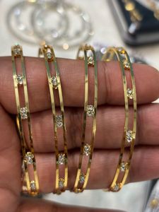 Elegant Gold Bangles with Rhinestones