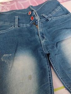 Distressed Blue Denim Jeans