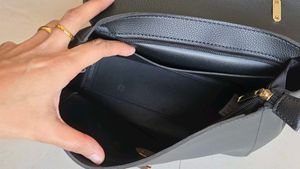 Chic Black Handbag with Gold Chain