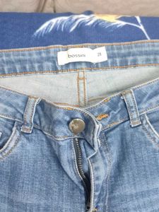 Distressed Light Wash Denim Jeans