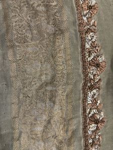 designer blouse piece in soft gold with hand work