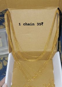 Gold Tone Chain Necklace and thred metrials