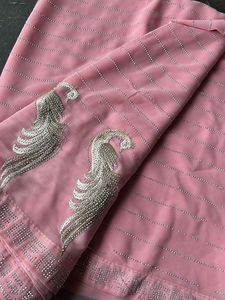 Elegant Pink Saree with Peacock Motif