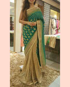 Elegant Teal & Gold Embellished Saree