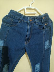 Dark blue side button trendy jeans