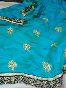 Elegant sea green Embroidered Saree