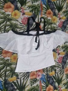 White Ruffle Top with Black Accents