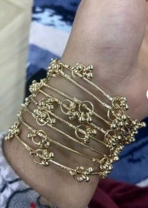 Set of Golden Kashmiri Bangles with Charms