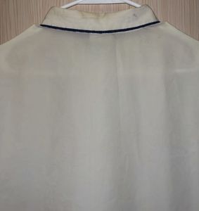 Elegant Cream Blouse with Blue Embroidery