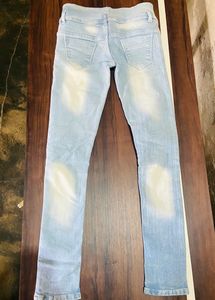 Damaged Pattern Ice Blue Colour Jeans’s….Waist: 26 Inches