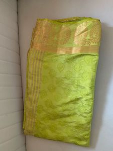 Vibrant Green Silk Saree with Gold Border