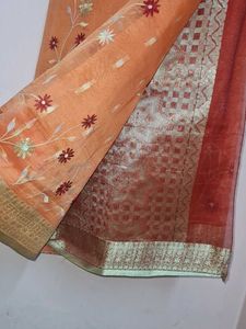 Elegant Orange Floral Saree🧡