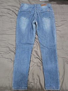 Distressed Blue Denim Jeans