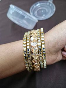Beautiful Golden Bangles with Heart Detailing- new