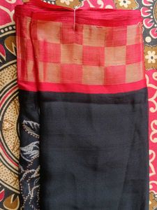 black golden and red colour saree