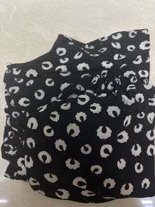 Black &amp; White Patterned Peplum Top with Solid