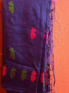 Blue Saree with Vibrant Figures