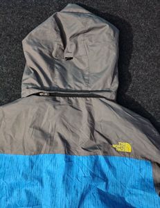 THE NORTH FACE BLUE AND GREY JACKET