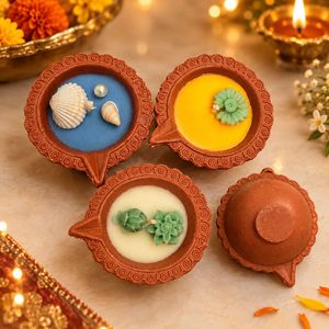 Decorative Diyas with Shells and Flowers
