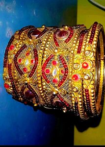 Elegant Gold and Ruby Bangle