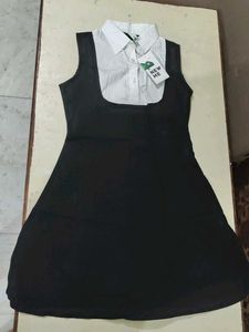 Sleeveless Black Dress with White Collar