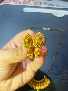 Shining Golden Mangalsutra With Ear Tops Medium Length With Stones/Diamond