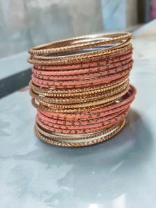 Stack of Peach & Gold Bangles