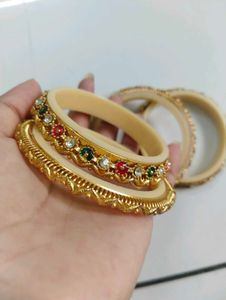 Exquisite Stone-Studded Gold Bangles