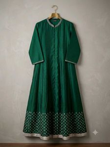 Elegant Green Gown with Embellished Border