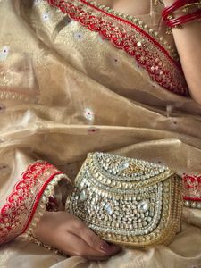 Elegant Golden Saree with Red Border