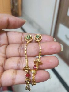 Elegant Gold Earrings with Red Stones