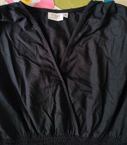 Chic Black Peplum Top with Puff Sleeves