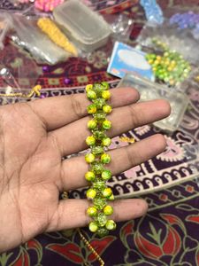 Green &amp; Yellow Beaded marble coloured Bracelet