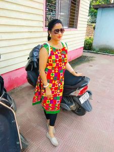 Multi Coloured Cotton Kurti With Pearls Attached On The Neck And Bottom Part.
