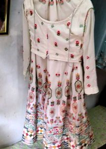 white multi pitch lehenga