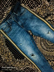 Distressed Blue Jeans with Side Stripe