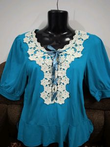 Cute Top ,there Is One Small Black Dot Below The Top But Not So Visible .you Can See In The Last Pic .if U Tug N Wear It Looks Amazing .