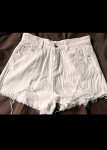 Torn White Denim Shorts