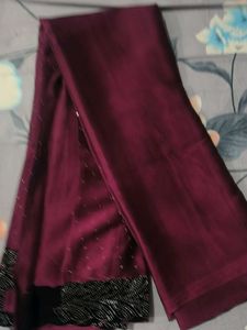Elegant Maroon Saree with Embellishments