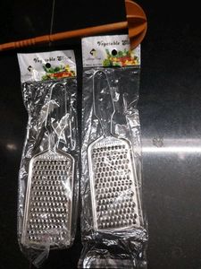 2 Stainless Steel Vegetable Slicers and ravi